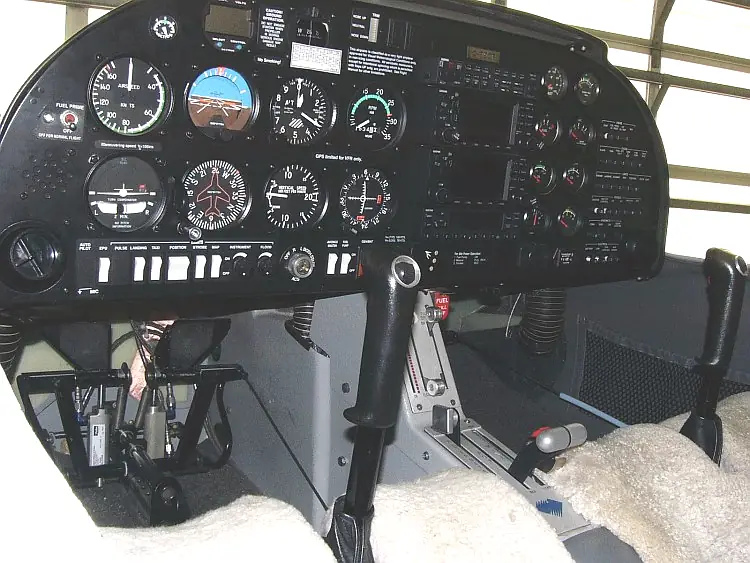 The analog instrument panel of a Diamond DA20 C1, with a six-pack of round flight instruments.